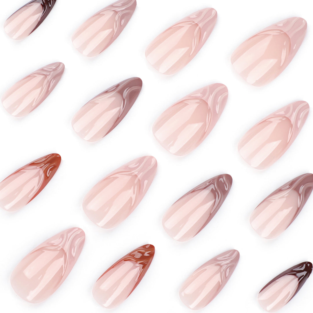 Artful stiletto nails with elegant gradient and glitter accents Stornfield