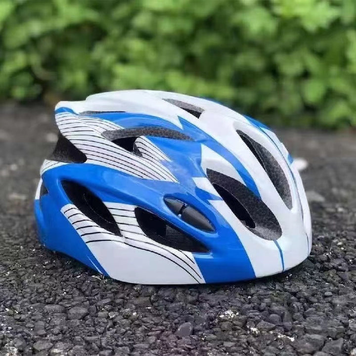 streamlined high-ventilation cycling helmet with micro-adjust retention and impact-absorbing liner Stornfield