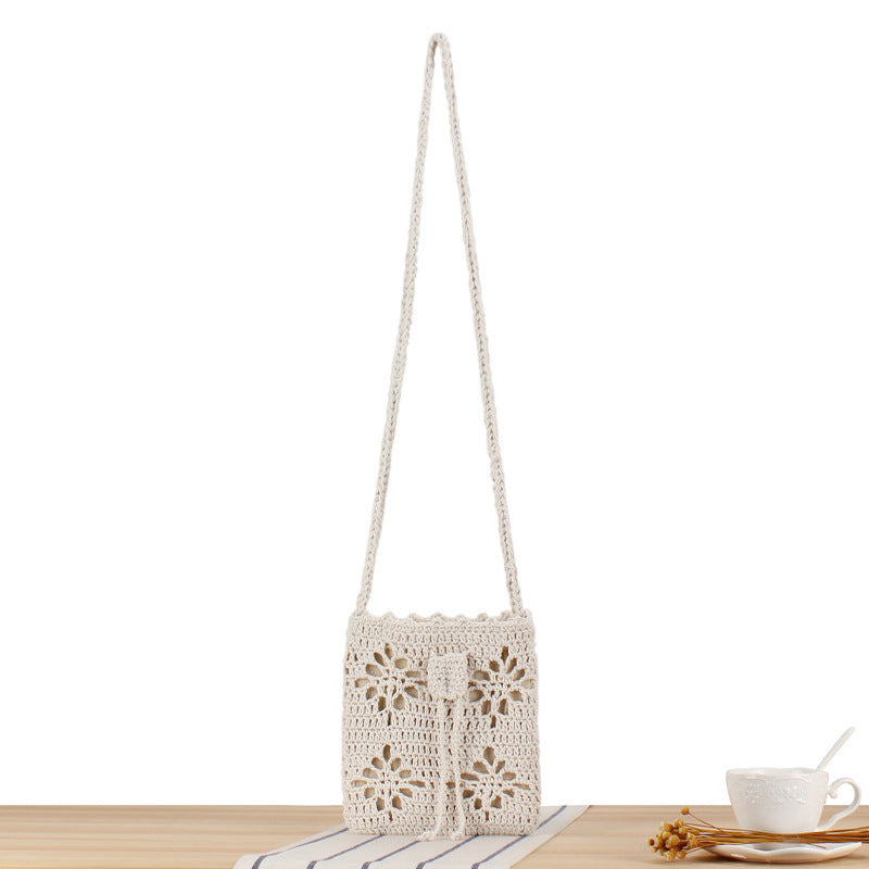 Hand-knotted shoulder bag with floral patterns Stornfield
