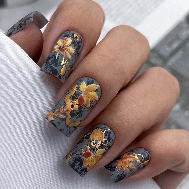 Artificial nails with colorful flower designs Stornfield