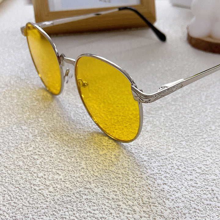 Fashionable sunglasses with round frame and intricate design Stornfield