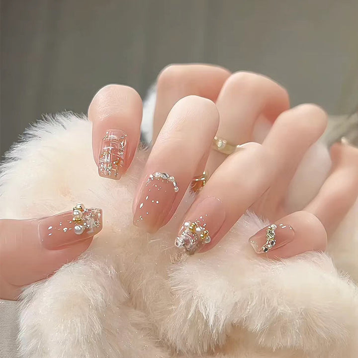 Artistic Press-On Nail Set with Glittery Star Accents Stornfield