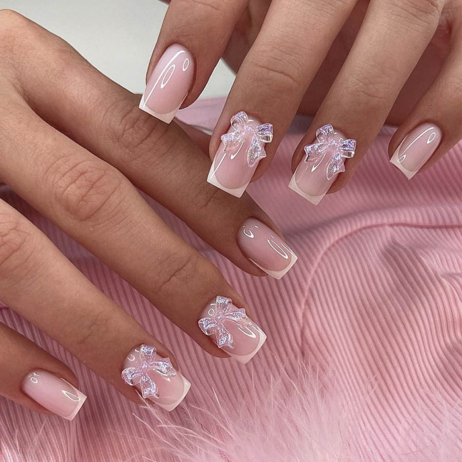 Acrylic nail set with elegant French tips and 3D details Stornfield