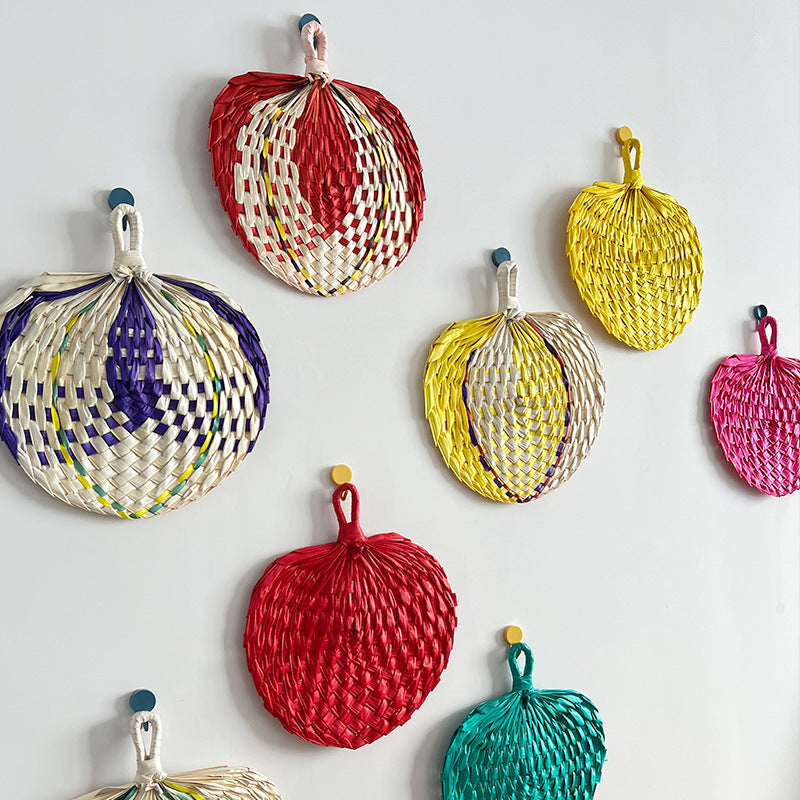 Women hand-woven fan made of natural material Stornfield