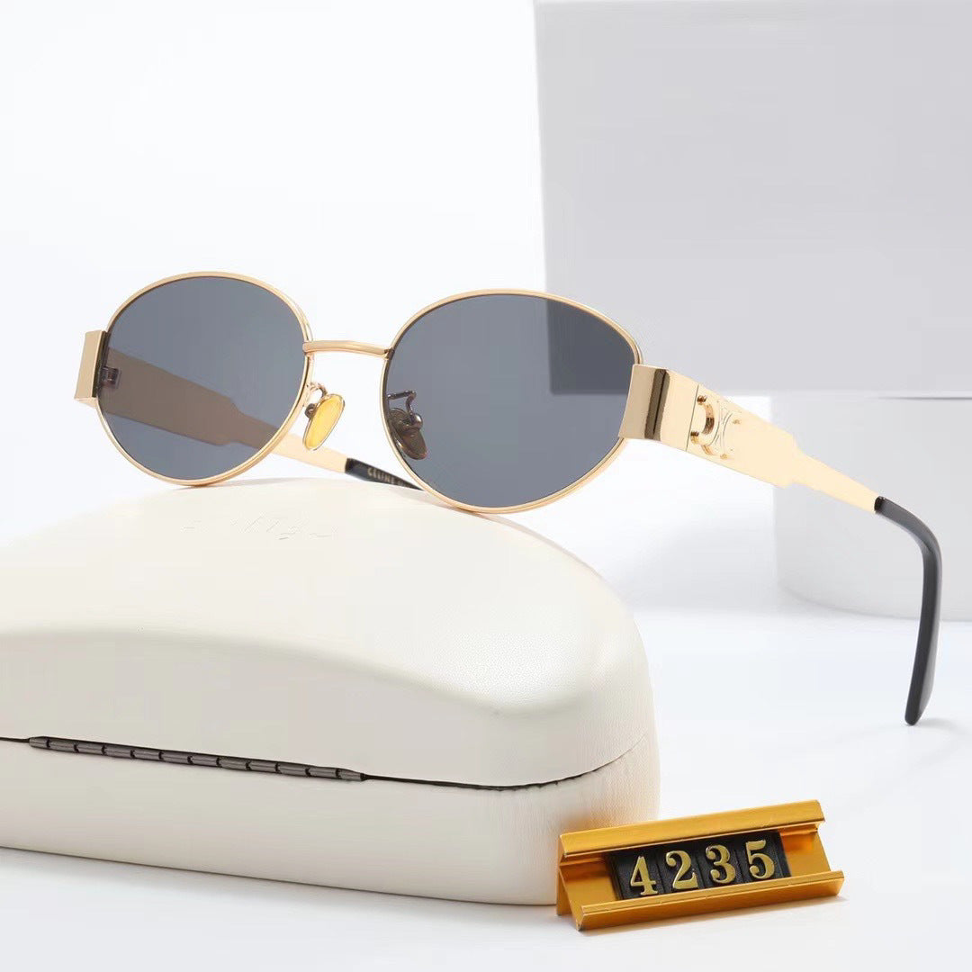 Women elegant oval sunglasses with gold-colored frame Stornfield