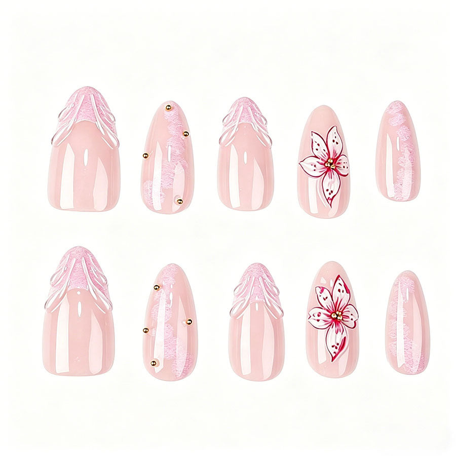 Artificial artificial nails with filigree floral motifs and golden accents Stornfield