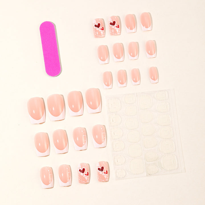 Heart-Embellished Acrylic Nail Art Extensions Stornfield