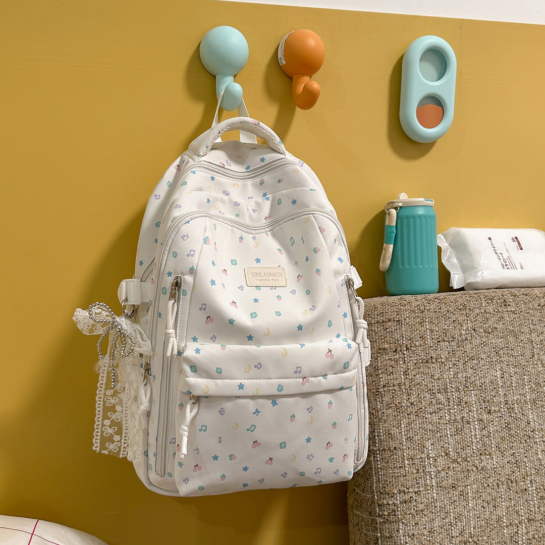 Stylish Multi-Pocket Backpack with Decorative Accents Stornfield