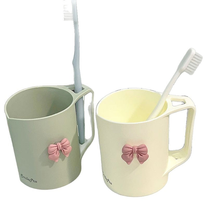 Ceramic mug with elegant bow motif Stornfield