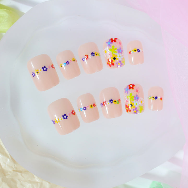 Artificial nail set with floral designs and high-quality embellishments Stornfield