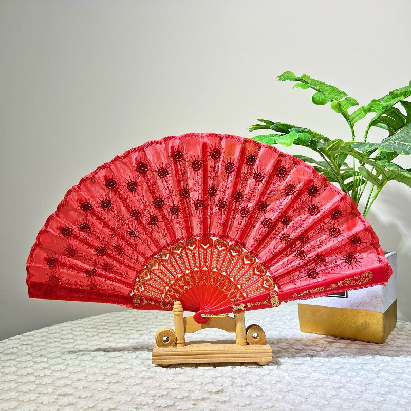 Women's folding fan with artistic decorations Stornfield