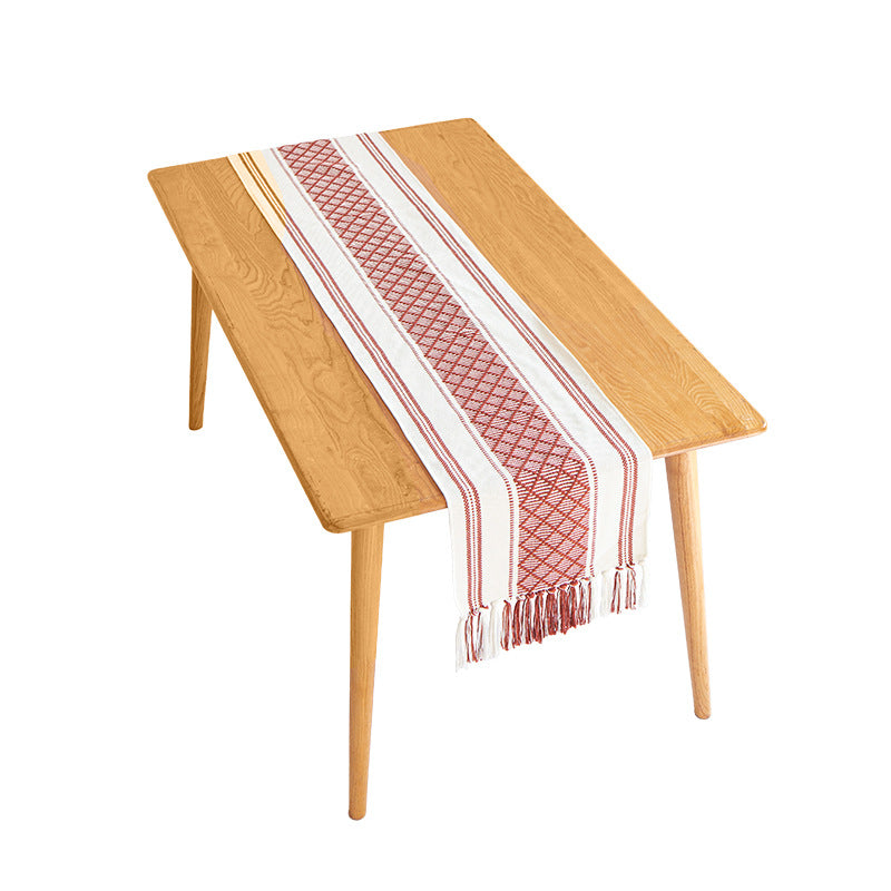 Handwoven cotton table runner with ethnic diamond pattern and fringes Stornfield