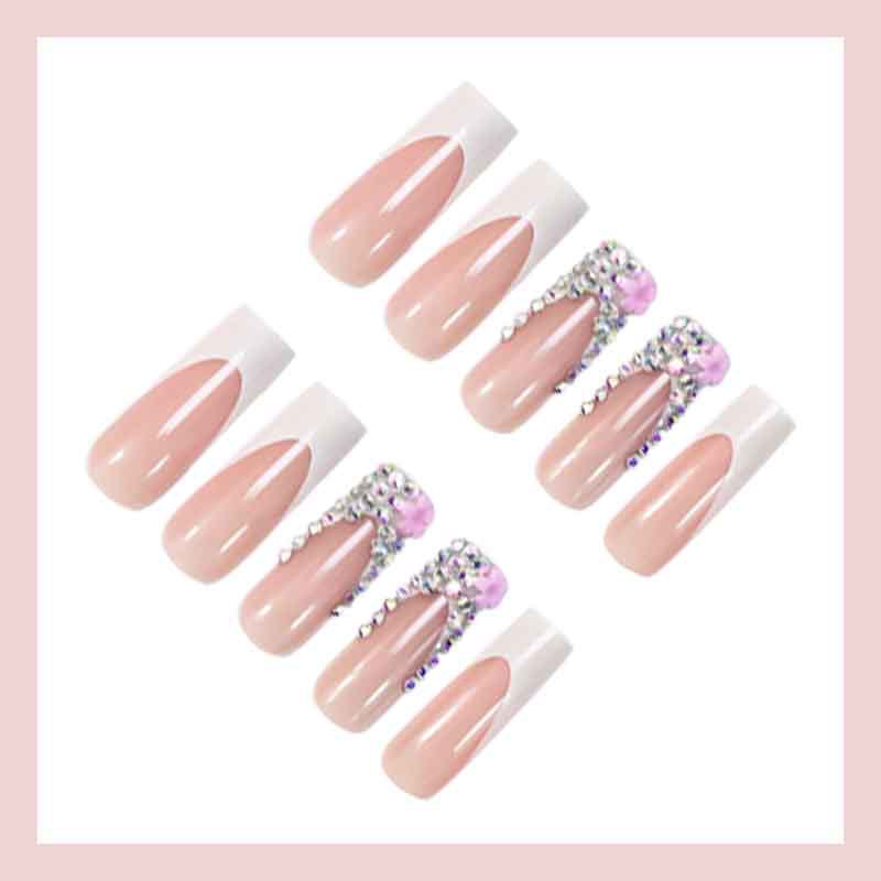 Art nail set with elegant glitter and floral accents Stornfield