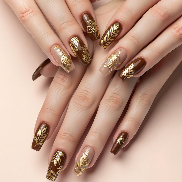 Artificial nails with floral gold design Stornfield