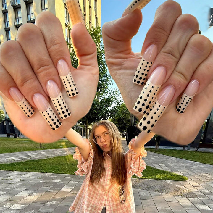 Artificial nail set with elegant dots and glitter accents Stornfield