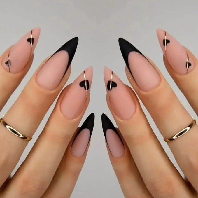 Heart-Embellished Stiletto Nail Art Stornfield