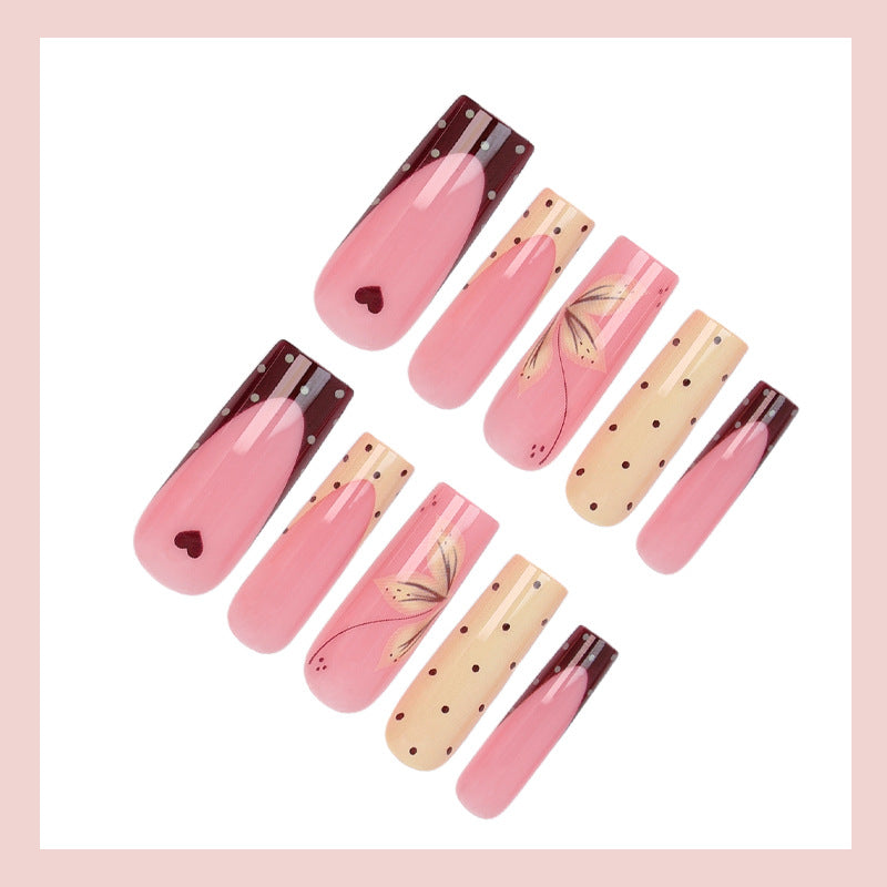 Acrylic nail set with elegant floral and polka dots design Stornfield