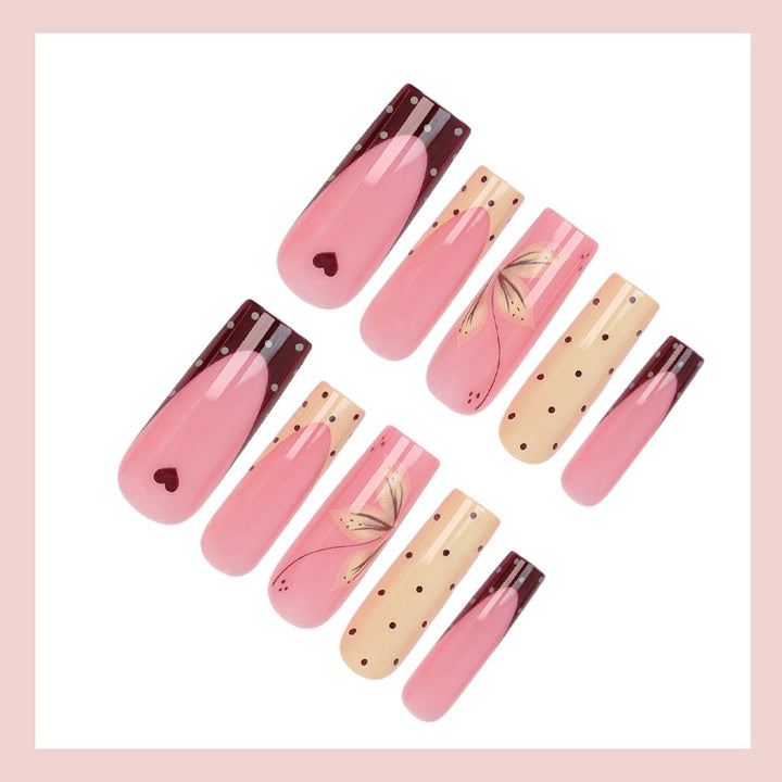 Acrylic nail set with elegant floral and polka dots design Stornfield