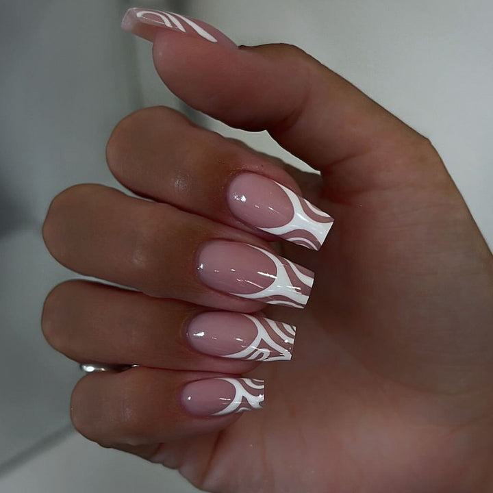 Artful nail extensions with translucent design and elegant lines Stornfield
