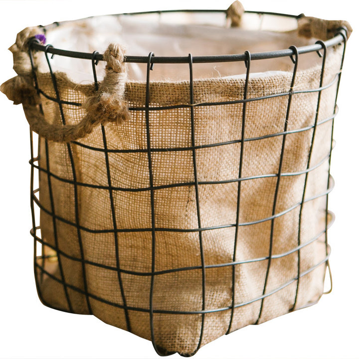 Decorative storage basket made of wire and linen Stornfield