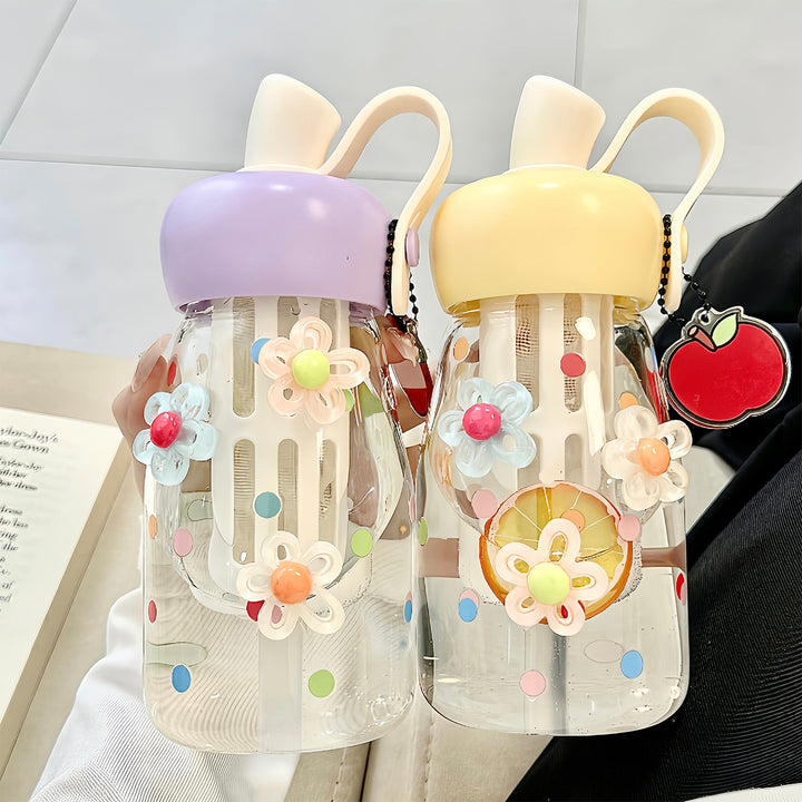Women's water bottle with integrated fruit filter and practical carrying handle Stornfield