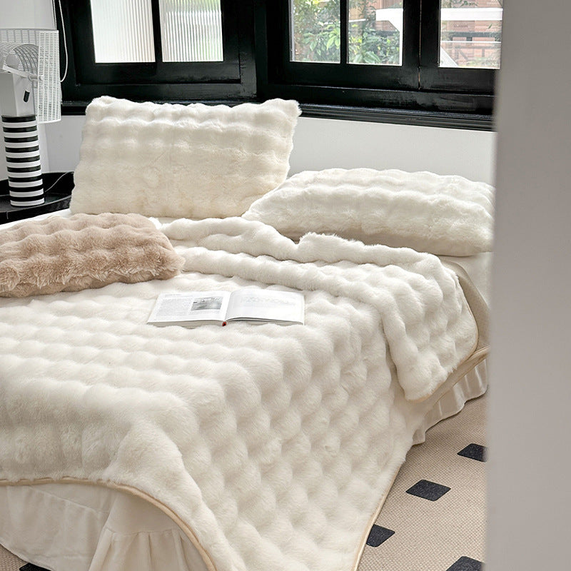 Padded microfiber mattress topper with wave stitching and plush surface