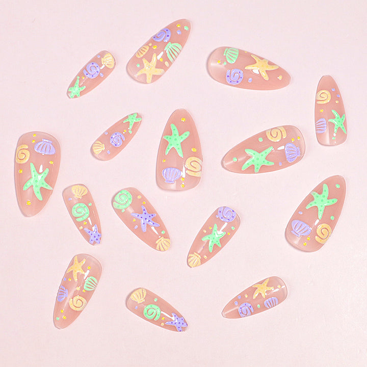 Artistic Press-On Nail Design with Ocean-Inspired Accents Stornfield