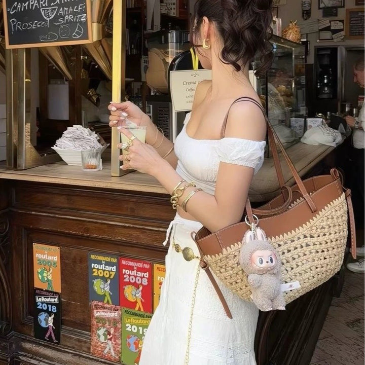 Braided handbag with elegant leather trim Stornfield