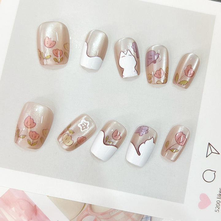 Artistic nail tips with floral motifs Stornfield