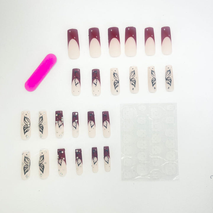 Artistic Long Nail Extensions with Butterfly Design Stornfield