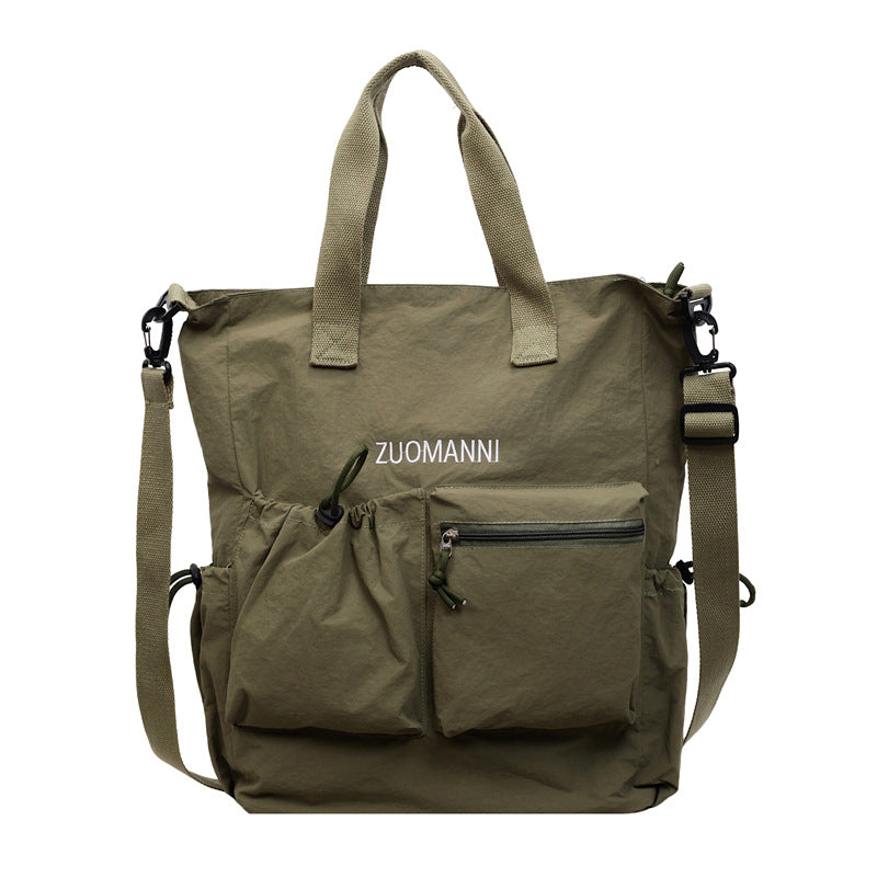 Tote bag with multifunctional outer pockets and adjustable shoulder strap Stornfield