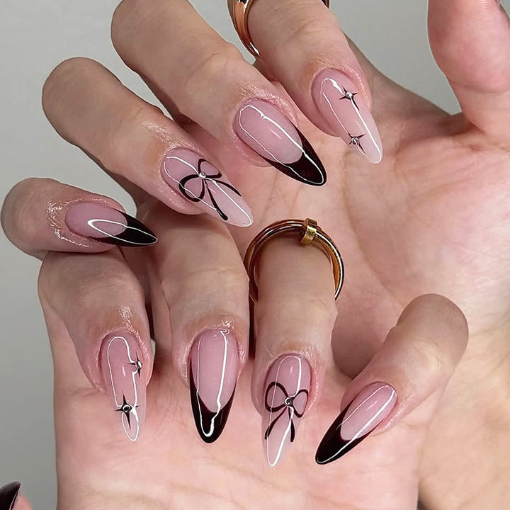 Artificial nail set with elegant cut and bow decorations Stornfield
