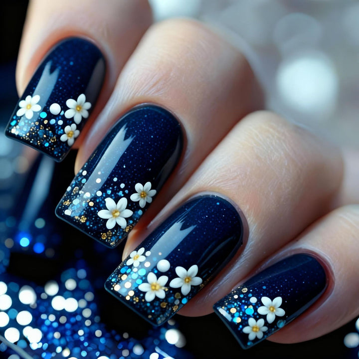 Acrylic nail set with elegant flower design and glitter accents Stornfield