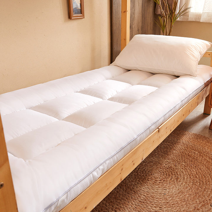 Japanese futon topper made of microfiber with triple foldable design and high point elasticity