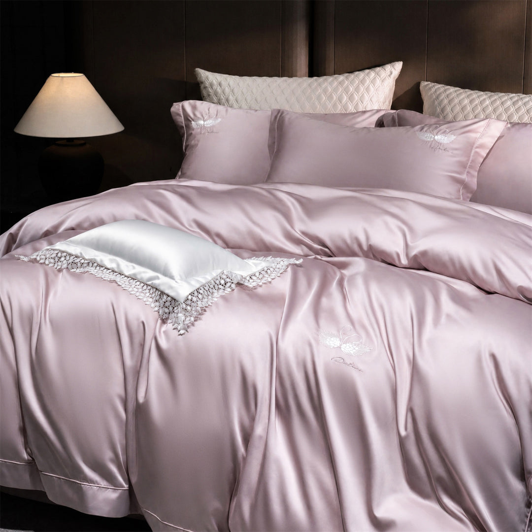Luxurious satin bedding set with embroidered swan motif and lace pillow