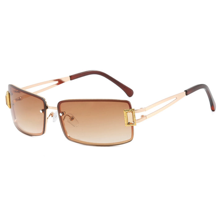 Ladies stylish sunglasses with elegant trapezoidal lenses and filigree metal frame Stornfield