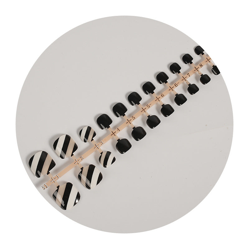Stylish Press-On Nail Set with Striped Design Stornfield