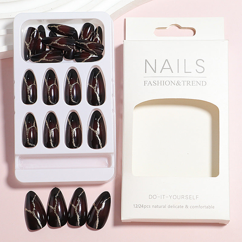 Artistic Press-On Nail Design with Gold Veining Accents Stornfield