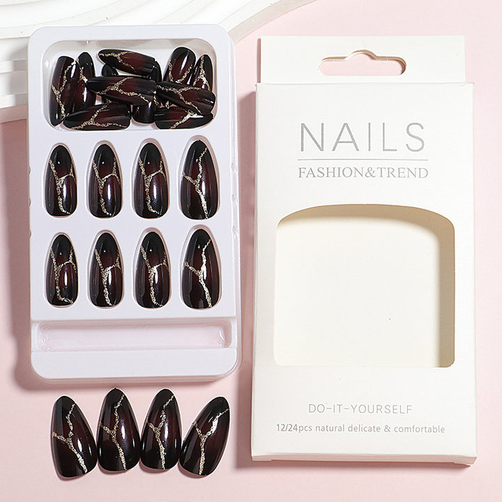 Artistic Press-On Nail Design with Gold Veining Accents Stornfield