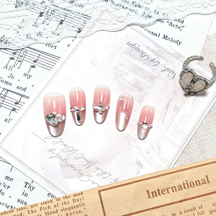 Artificial nails with luxurious jewelry accents Stornfield