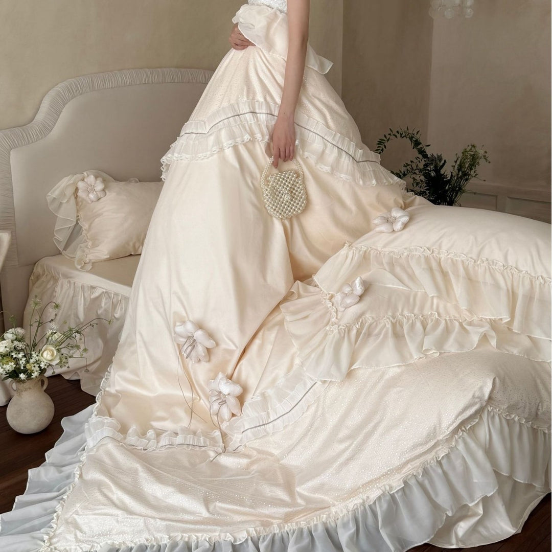 Romantic bedding set made of cotton satin with ruffled flounce, layered ruffles, and decorative fabric flowers