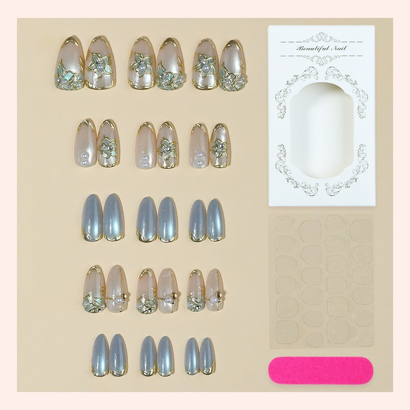 Artificial nail set with elegant floral decorations and shine Stornfield