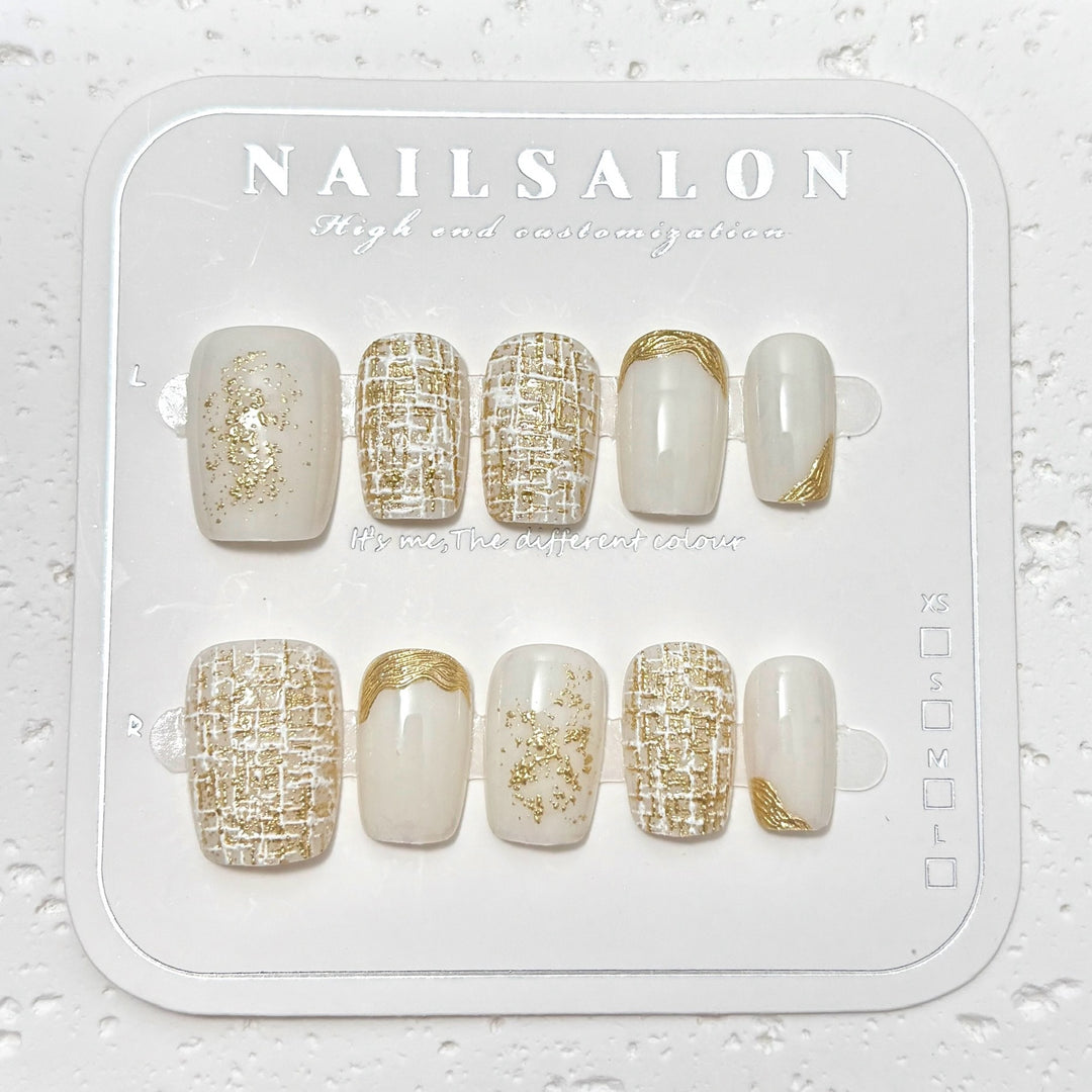 Elegant Press-On Nail Set with Decorative Gold Accents