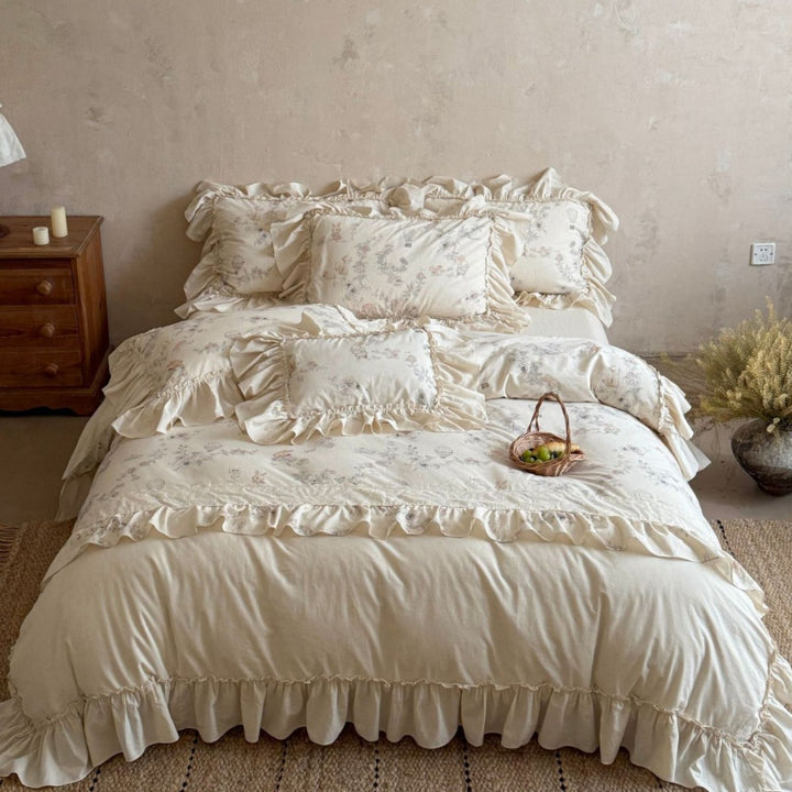 Romantic bedding set with ruffles, floral jacquard application and decorative cushions