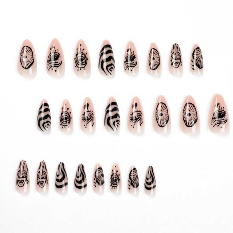 Artistic acrylic nails in elegant stiletto design with graphic patterns Stornfield