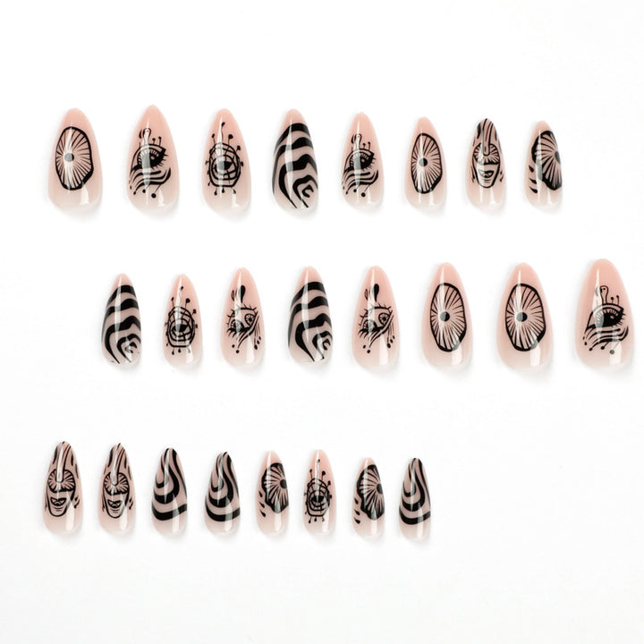 Artistic acrylic nails in elegant stiletto design with graphic patterns Stornfield