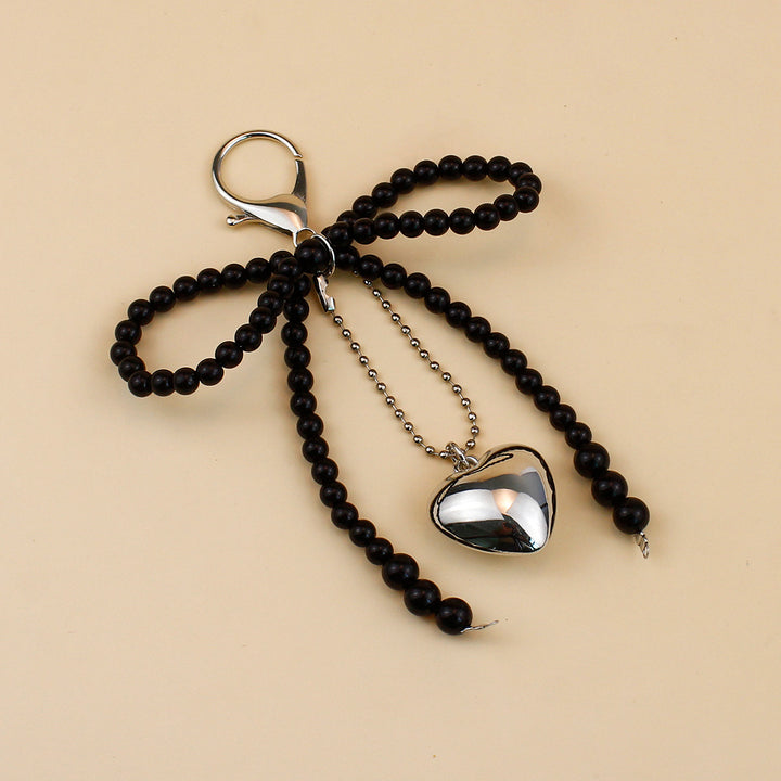 Elegant Pearl Bow Brooch Stornfield