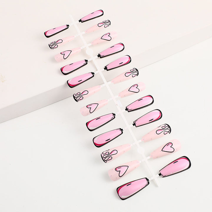 Eye-catching artificial nails with soulful heart design and glamorous accents Stornfield