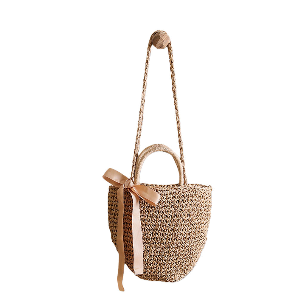 Basket bag with stylish carrying handles and decorative bow Stornfield