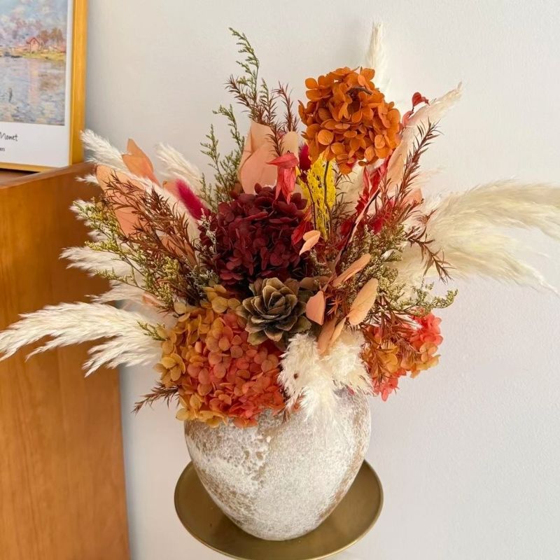 Dried Floral Arrangement with Decorative Accents